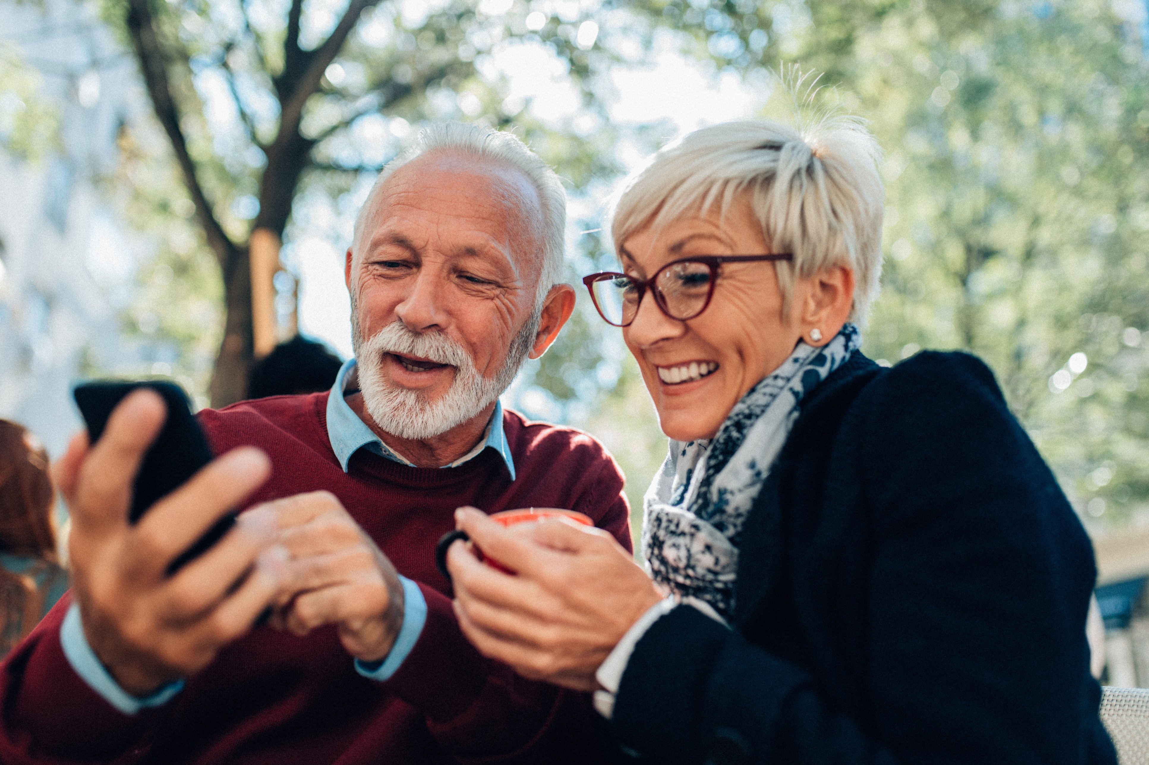 Mature Couple Using Smartphone